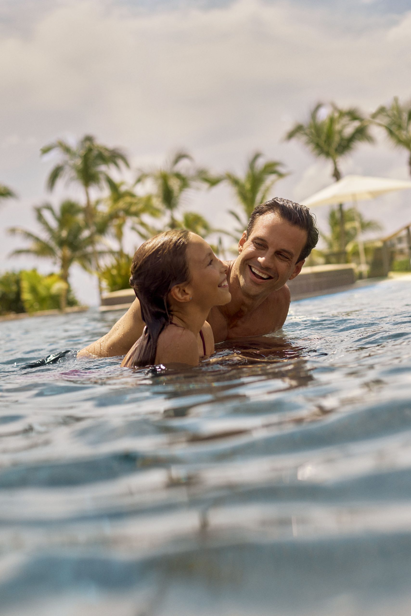 Conrad Tulum Riviera Maya, Family Friendly Vacation. Kids friendly luxury resort, pool experience. Lifestyle Brand Photo.
